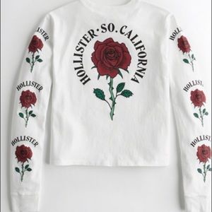 White Hollister shirt with roses.